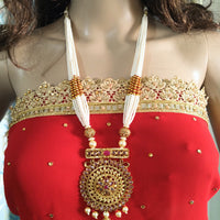 N0137_Gorgeous white colored multi layered bead Necklace with large pendant studded with American Diamond stones with a touch of pearls.