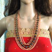 N013_Gorgeous peach colored crystal necklace studded with semi precious stones.