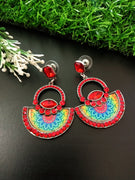 E0500_ Classy crafted earrings with beautiful art work pattern and with a touch of bright red stones and beads(medium size hanging)