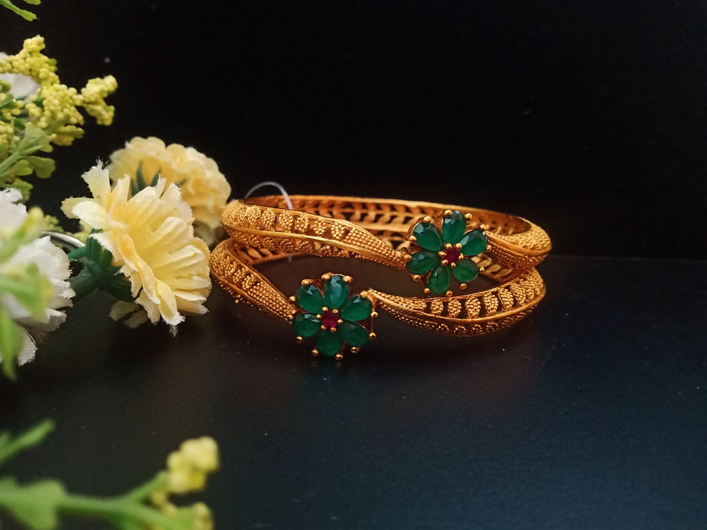 B031_Gorgeous 1 gm Gold plated bangles studded with green ruby stones.