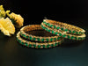 B061_Gorgeous Gold plated bangles studded with  American Diamond stones.