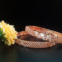B057_ Classy Rose Gold plated bangles studded with  American Diamond stones.