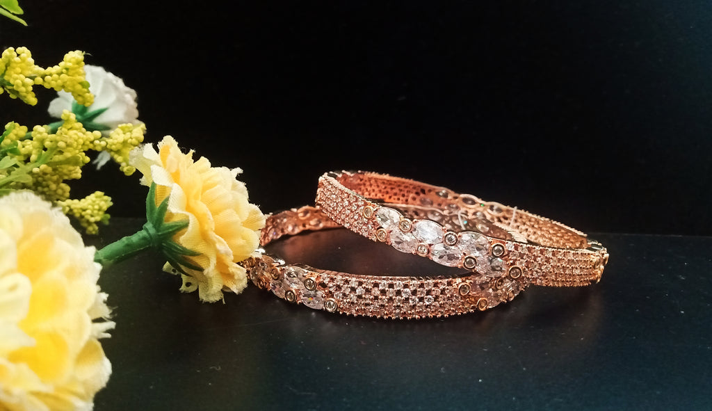 B057_ Classy Rose Gold plated bangles studded with  American Diamond stones.