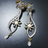 E0804_Elegant dazzling flower design american diamond stone studded earring with a touch of pearl.