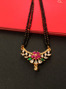 N0181_Elegant style mangalsutra with fine floral design studded with American Diamond stones with a touch of pink and green ruby stones.