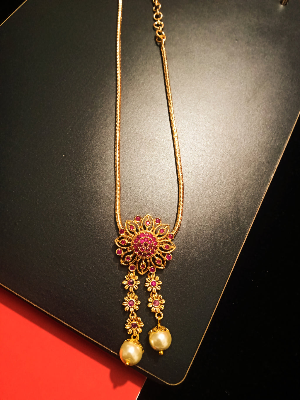 N0188_Elegant Micro Gold plated Necklace with delicate  flowery pattern design studded with Precious pink ruby stones with a touch of pearls.