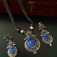 N0217_Classic German Silver Oxidized layered necklace set with delicate work of floral pattern pendant studded with beautiful blue stones.