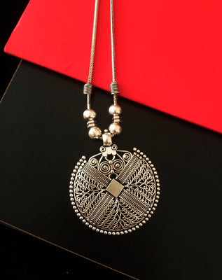 N0211_Exquisite German Silver Oxidized necklace with a over sized pendant with delicate art work.
