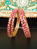 B022_S_Classy Style Gold plated Bangles studded with American Diamond stones .