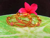 B016_Classy Style Gold Plated Bangles studded  with pink ruby stones.