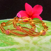 B016_Classy Style Gold Plated Bangles studded  with pink ruby stones.