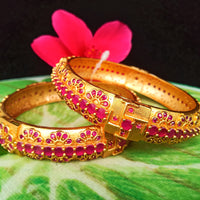 B034_Gorgeous Gold plated bangles matte finish studded with pink ruby stones.