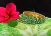 B061_Gorgeous Gold plated bangles studded with  American Diamond stones.