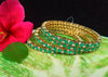 B061_Gorgeous Gold plated bangles studded with  American Diamond stones.