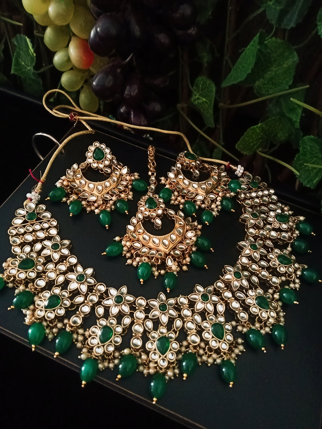 N0220_Classic Elaborated choker necklace set studded with Kundan stones with a touch of glossy green beads.