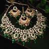 N0220_Classic Elaborated choker necklace set studded with Kundan stones with a touch of glossy green beads.