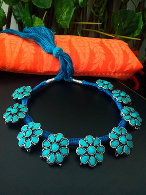 N0232_Vibrant German Silver Oxidized thread choker necklace set with delicate craft work of floral pattern studded with beautiful blue stones.