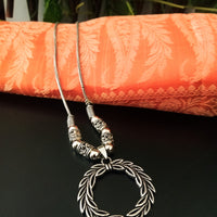 N0229_Elegant German Silver Oxidized necklace set with delicate craft work of leaf pattern circular shaped pendant with a touch of beads on the chain.