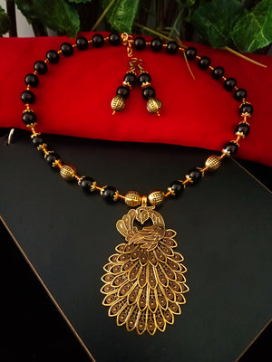 N0238_ Gorgeous German Silver oxidized crafted necklace with delicate work of peacock design pendant with a touch of Glossy golden & black color beads.