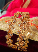 B0117_S_Lovely traditional Vintage Style Gold Plated along with american diamond studded Bangles.