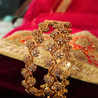 B0117_S_Lovely traditional Vintage Style Gold Plated along with american diamond studded Bangles.