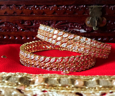 B013_Classy Style Gold Plated Bangles studded  with American Diamond stones.