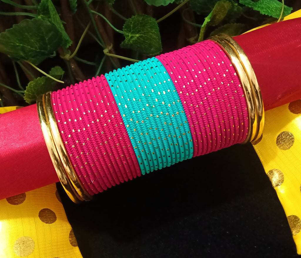 B0126_Exquisite bangle set with Colorful metal bangles along with Matte Gold plated plain bangles.