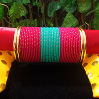 B0126_Exquisite bangle set with Colorful metal bangles along with Matte Gold plated plain bangles.