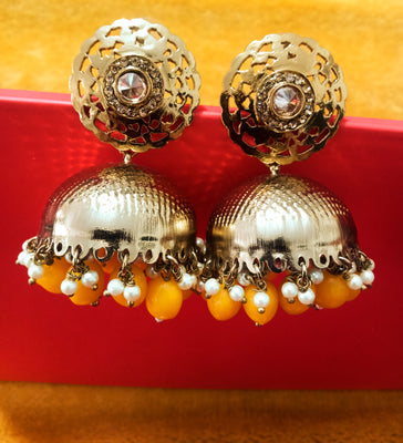 E020_Glossy golden colored high quality & light weight large jumka earring with delicate work of yellow colored beads and  Meenakari work.