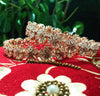 B0155_S_Elegant Rose gold bangle with flower design studded with American Diamond stones.