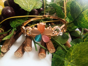 B0111_Elegant  metal base color flower design bracelet studded with  stones (Free size).