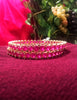 B0163_Elegant Golden crafted bangles studded with pink ruby stones with a touch of American Diamond stones.