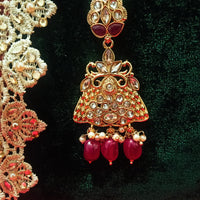M06_Gorgeous stone studded Gold base color Maang Tika with delicate peacock design with touch of beads.