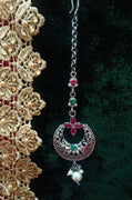 M09_Gorgeous Pink & Green ruby stone studded silver base color Circular shaped Maang Tika with touch of pearls.
