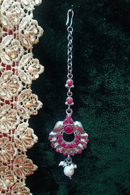 M010_Lovely semi precious Pink ruby stone studded silver base color Maang Tika with touch of pearls.