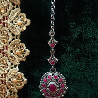 M012_Lovely semi precious Pink ruby stone studded silver base color Maang Tika with touch of pearls.