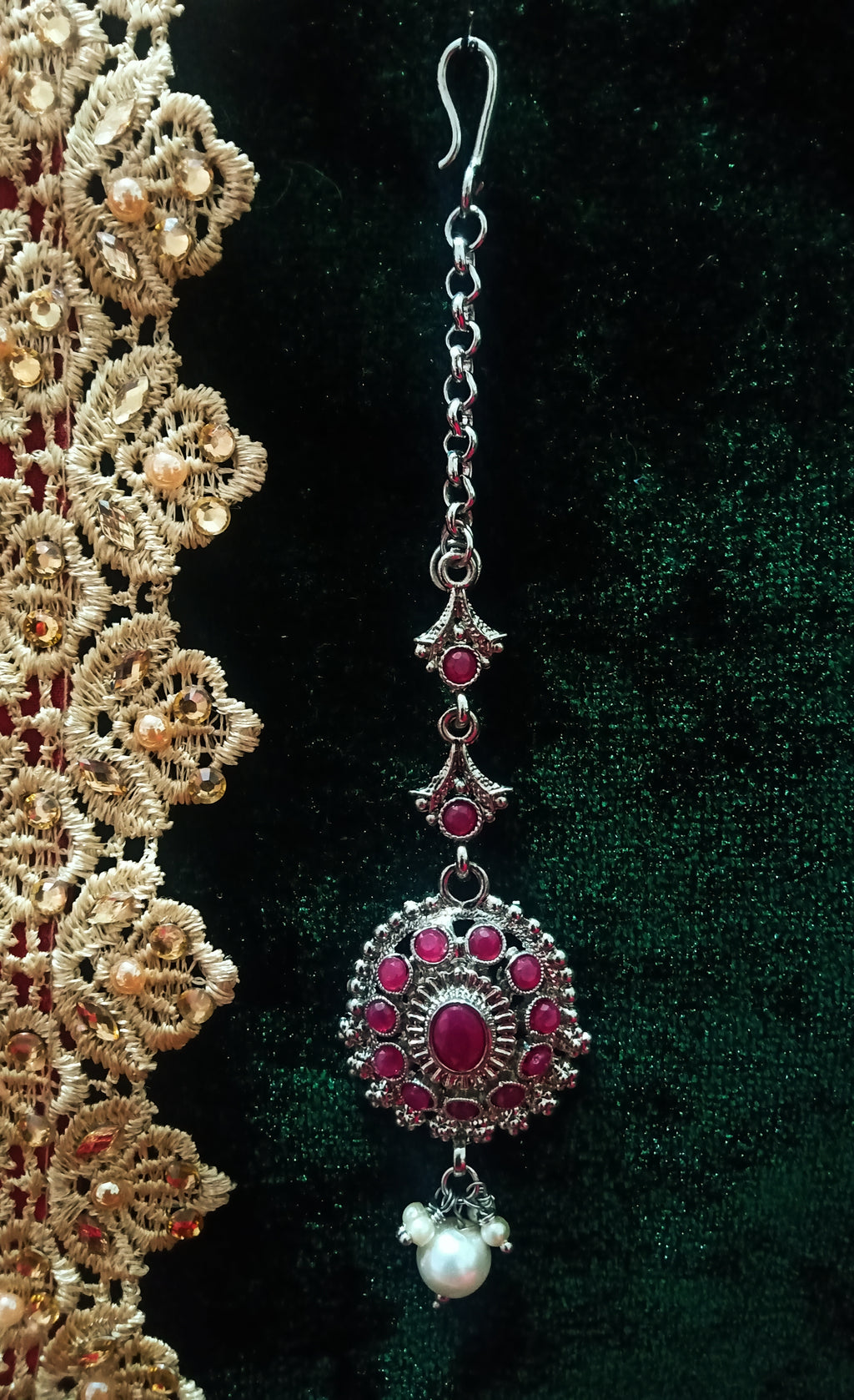M012_Lovely semi precious Pink ruby stone studded silver base color Maang Tika with touch of pearls.