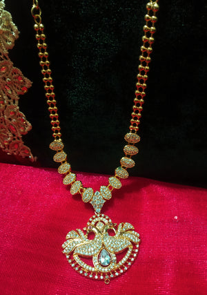 N0253_Elegant Micro Gold plated Necklace with delicate work of broad pendant studded with American Diamond stones.