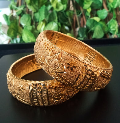 B0172_Gorgeous Crafted Gold plated broad bangles with beautiful delicate work.