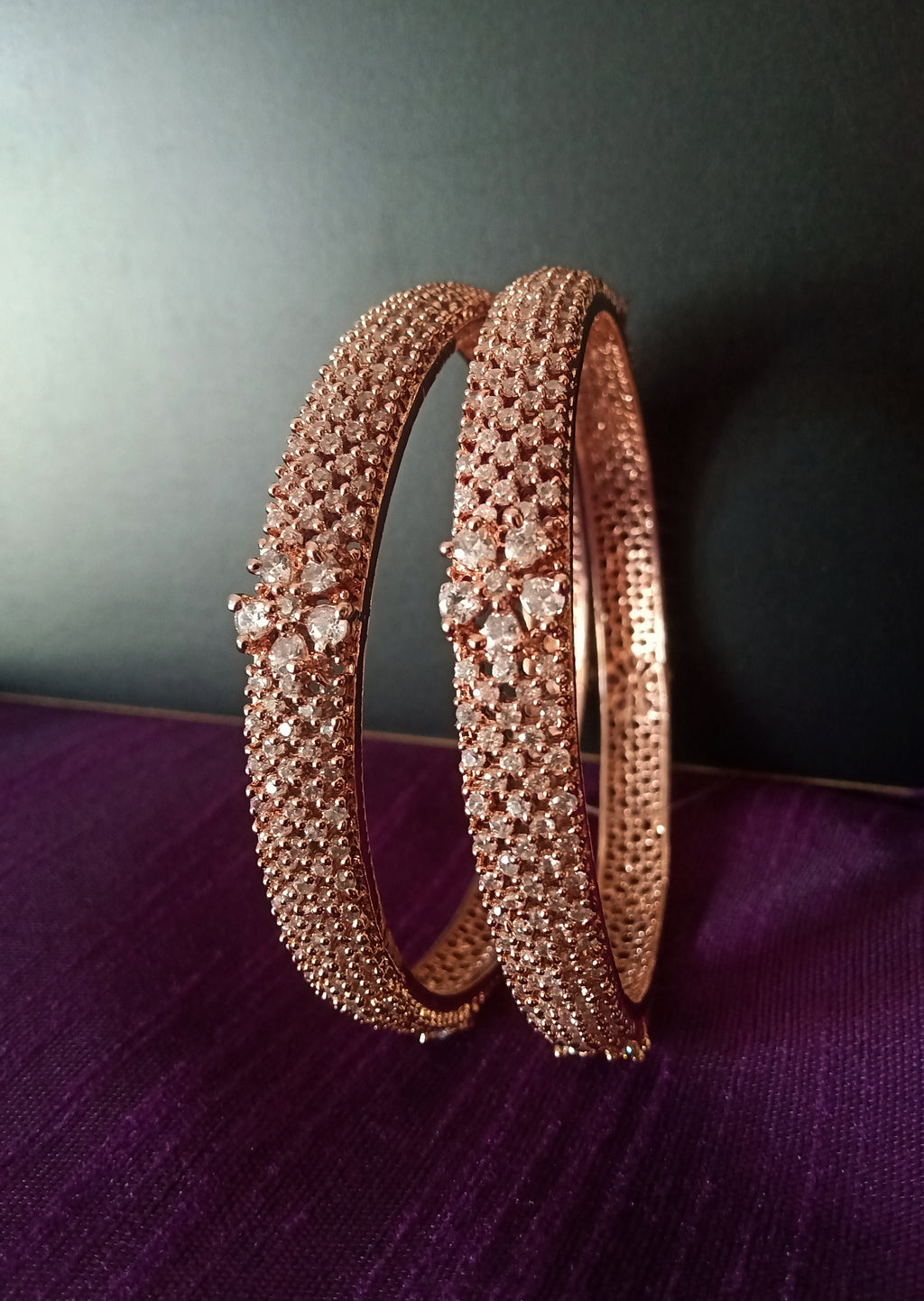 B0175_Elegant delicate crafted Rose gold bangles embellished with American Diamond stones.