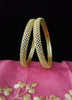 B060_Gorgeous Gold plated bangles studded with  American Diamond stones.