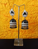 E0632_Gorgeous white and black enamel color Meenakari jumkas with a touch of black beads.