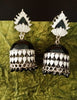 E0632_Gorgeous white and black enamel color Meenakari jumkas with a touch of black beads.