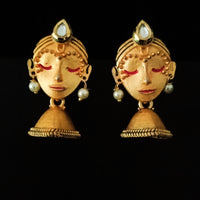 E0635_Beautiful crafted women face embossed earrings with a touch of stones.