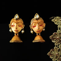 E0635_Beautiful crafted women face embossed earrings with a touch of stones.