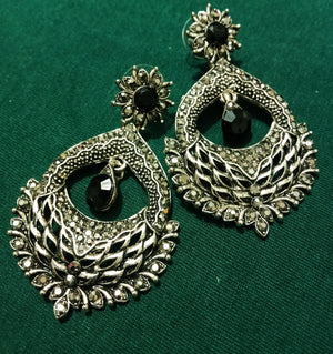 E0695_Classy german silver oxidized danglers with delicate craft work with a touch of black stones.