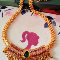 N0163_Elegant Micro Gold plated Necklace set studded  with a touch of pink & green ruby stones with a touch of pearls.