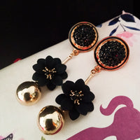 E0711_Lovely crafted flower design danglers with delicate work with a touch of stones and glossy golden beads.