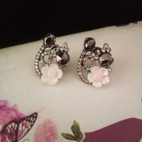 E0718_Lovely flower design studs with delicate stone work.