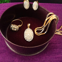 N080_Elegant Gold & Silver plated dual tone necklace set with earrings and ring studded with American Diamond stones.